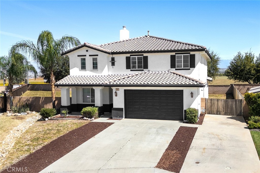 3505 Crevice Way Perris, CA 92570 - Photo 1 of 1 a front view of a house with a yard