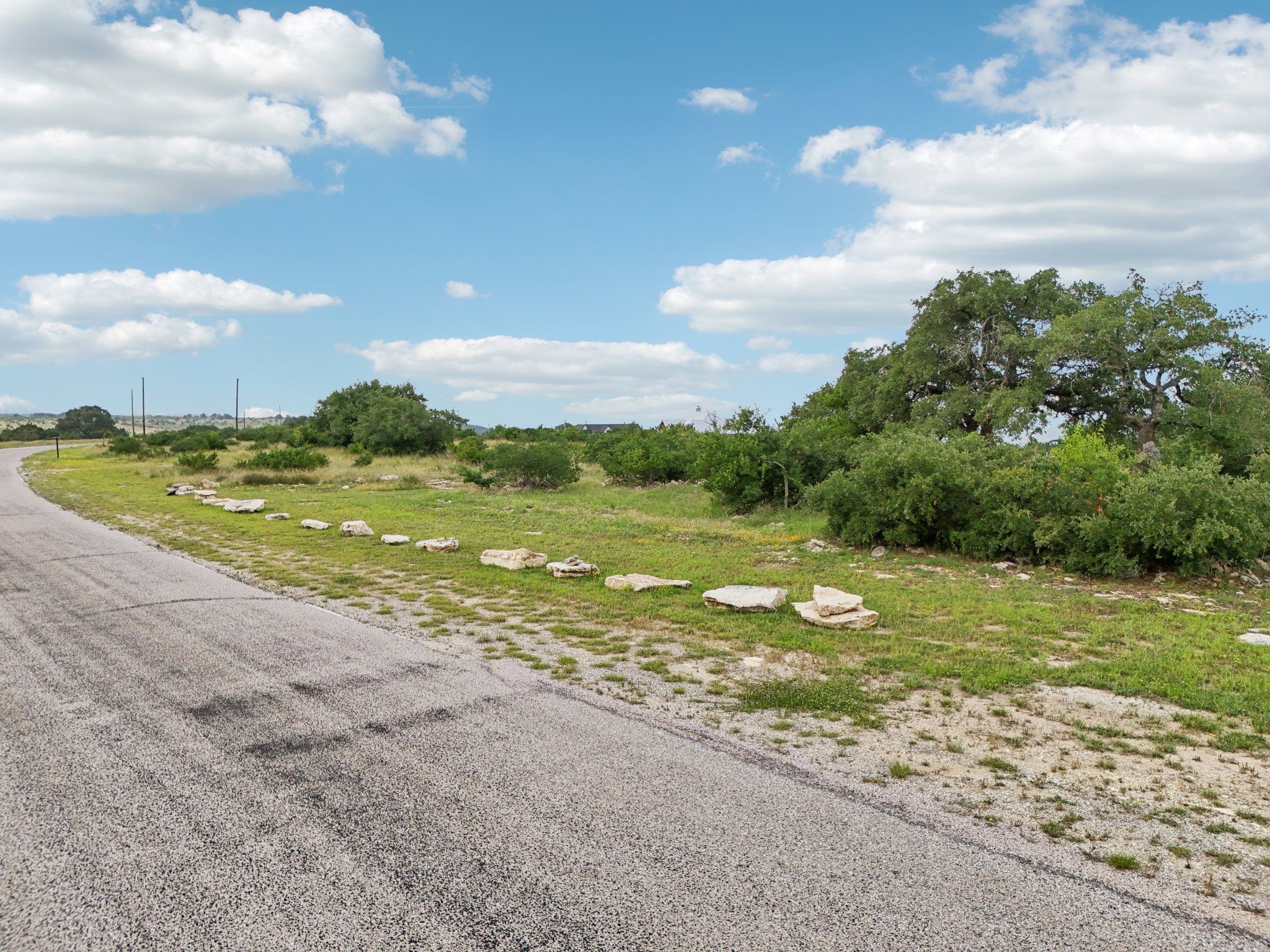 144 Cherokee Ridge Bertram, TX 78605 - Photo 22 of 32 View of asphalt road