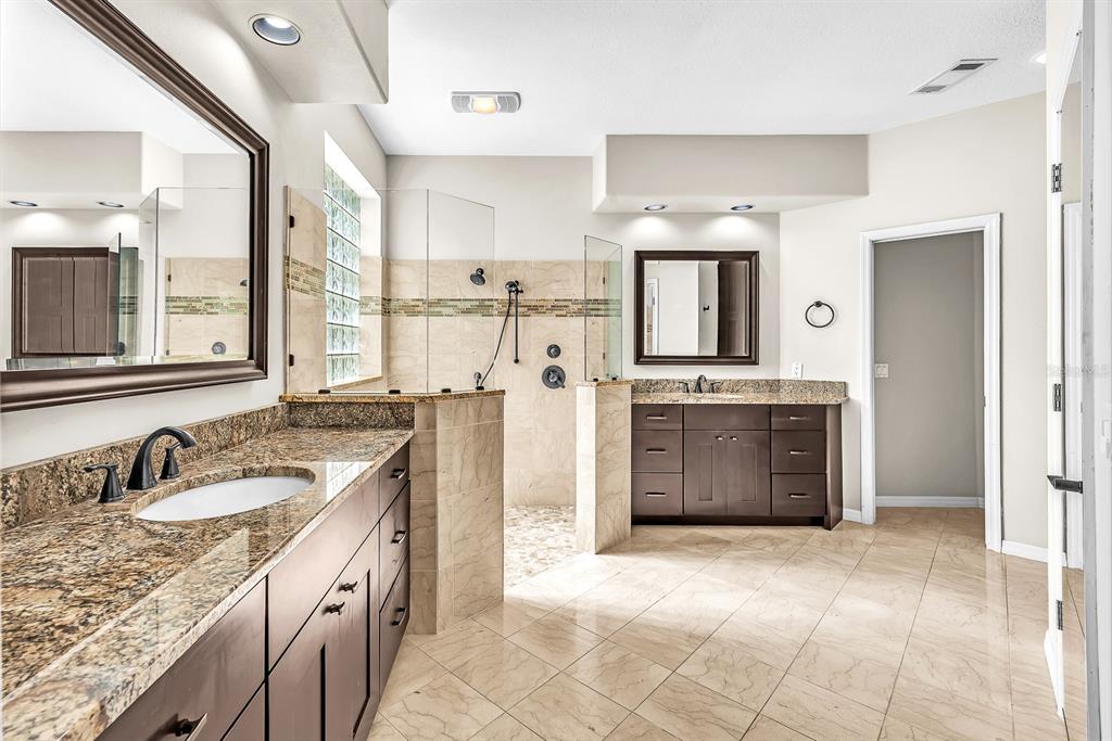 3504 Old Course Lane Valrico, FL 33596 - Photo 21 of 59 a kitchen with a sink stove and cabinets
