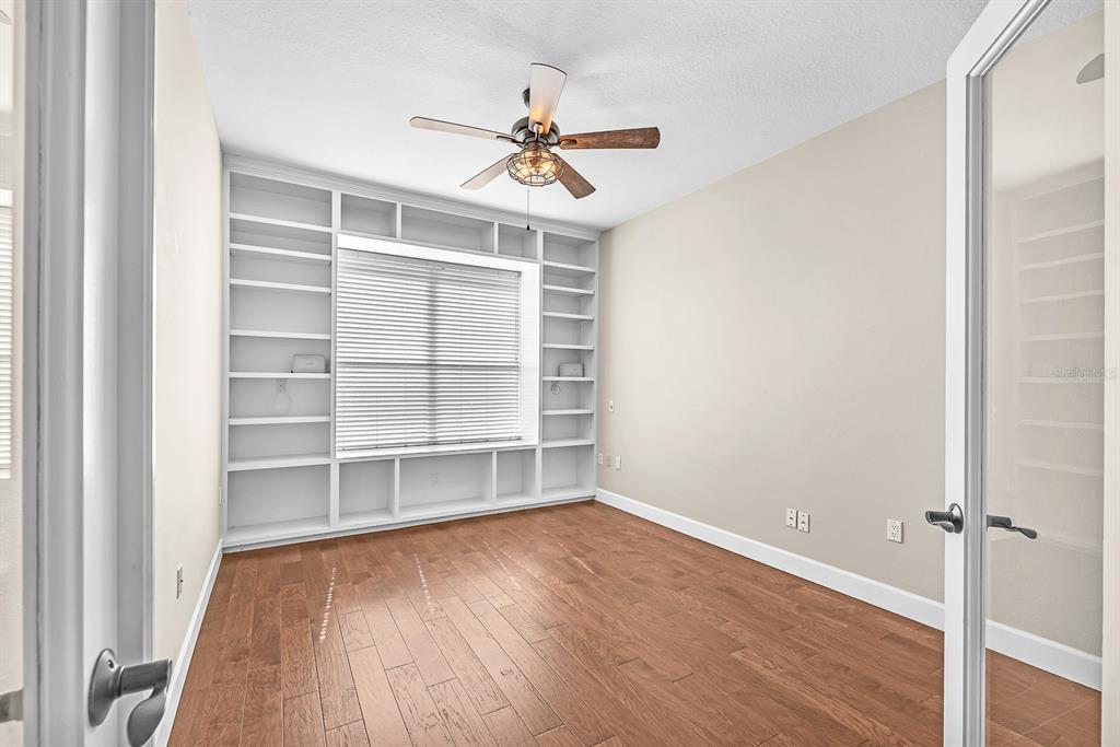 3504 Old Course Lane Valrico, FL 33596 - Photo 25 of 59 wooden floor in an empty room with a window