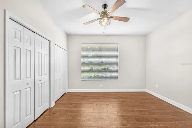 a view of a livingroom with a ceiling fan