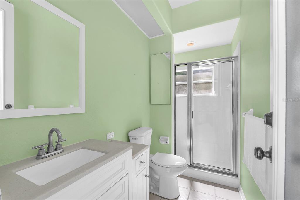 3504 Old Course Lane Valrico, FL 33596 - Photo 33 of 59 a bathroom with a sink toilet and shower