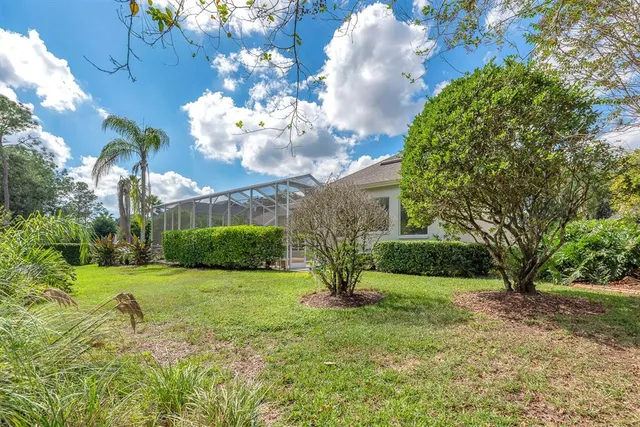 an aerial view of a house with a garden