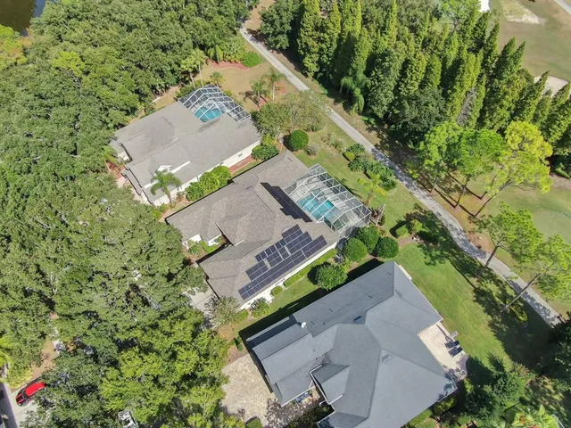 an aerial view of a house with a garden