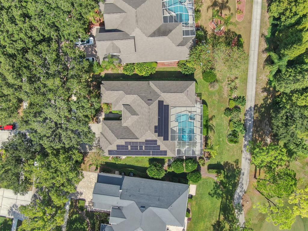 3504 Old Course Lane Valrico, FL 33596 - Photo 47 of 59 an aerial view of a house with a garden