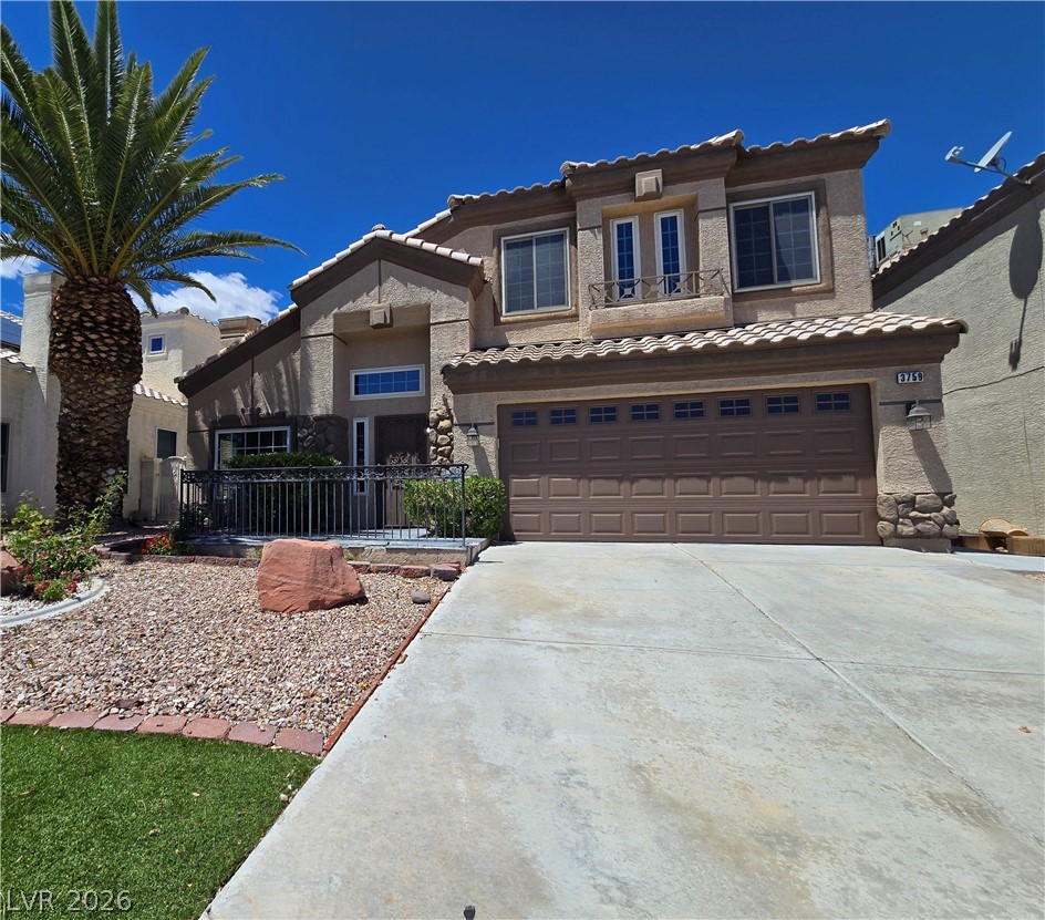 3759 Funston Way Las Vegas, NV 89129 - Photo 2 of 31 A well-maintained facade with mature landscaping provides a welcoming curb appeal to this inviting residence.