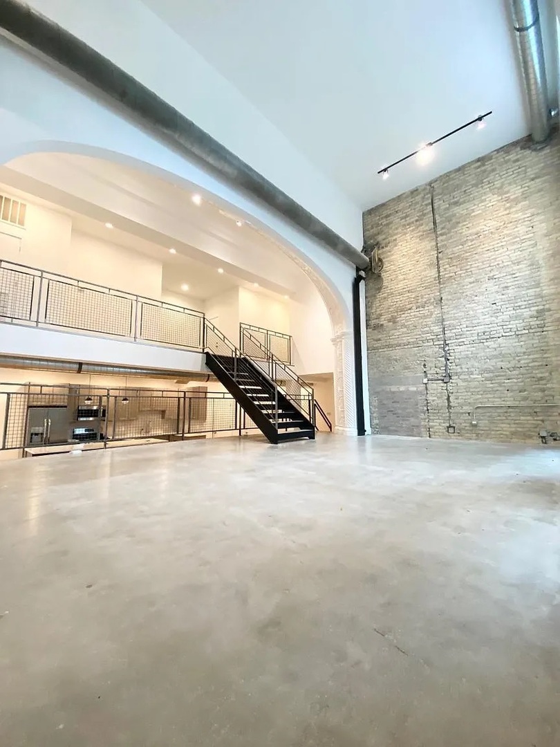 Undisclosed Address Chicago, IL 60640 - Photo 5 of 16 a view of a car park from a window