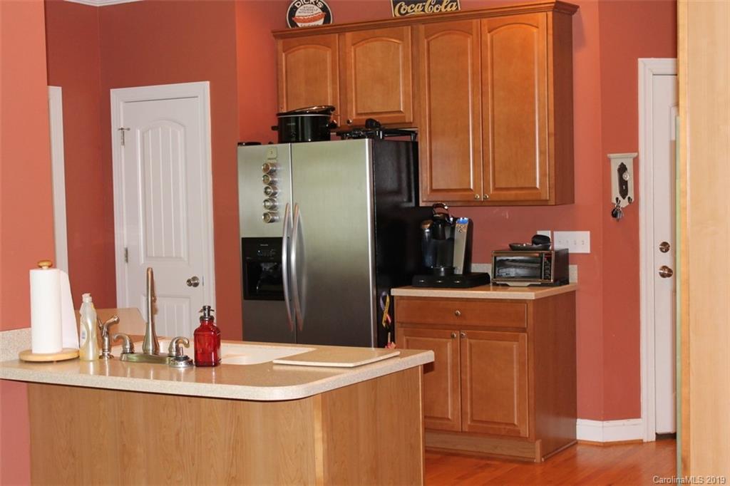 220 Beechtree Circle Rutherfordton, NC 28139 - Photo 11 of 26 a kitchen with stainless steel appliances a refrigerator and a sink
