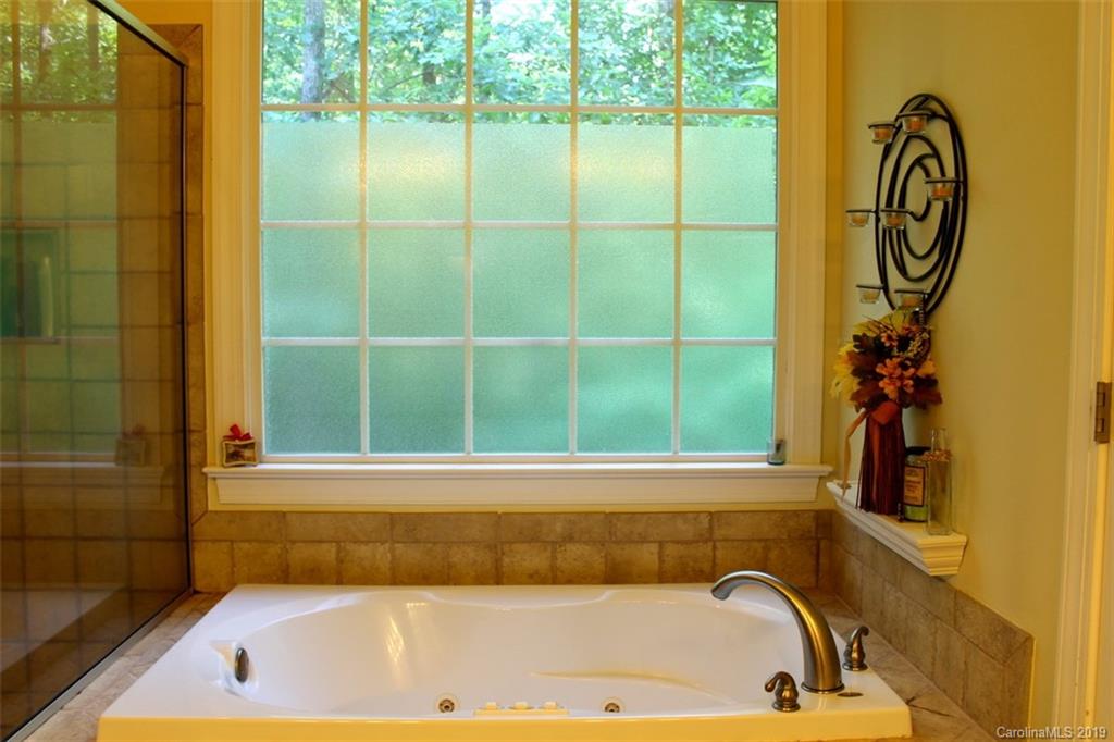 220 Beechtree Circle Rutherfordton, NC 28139 - Photo 15 of 26 a bathroom with a bathtub and shower