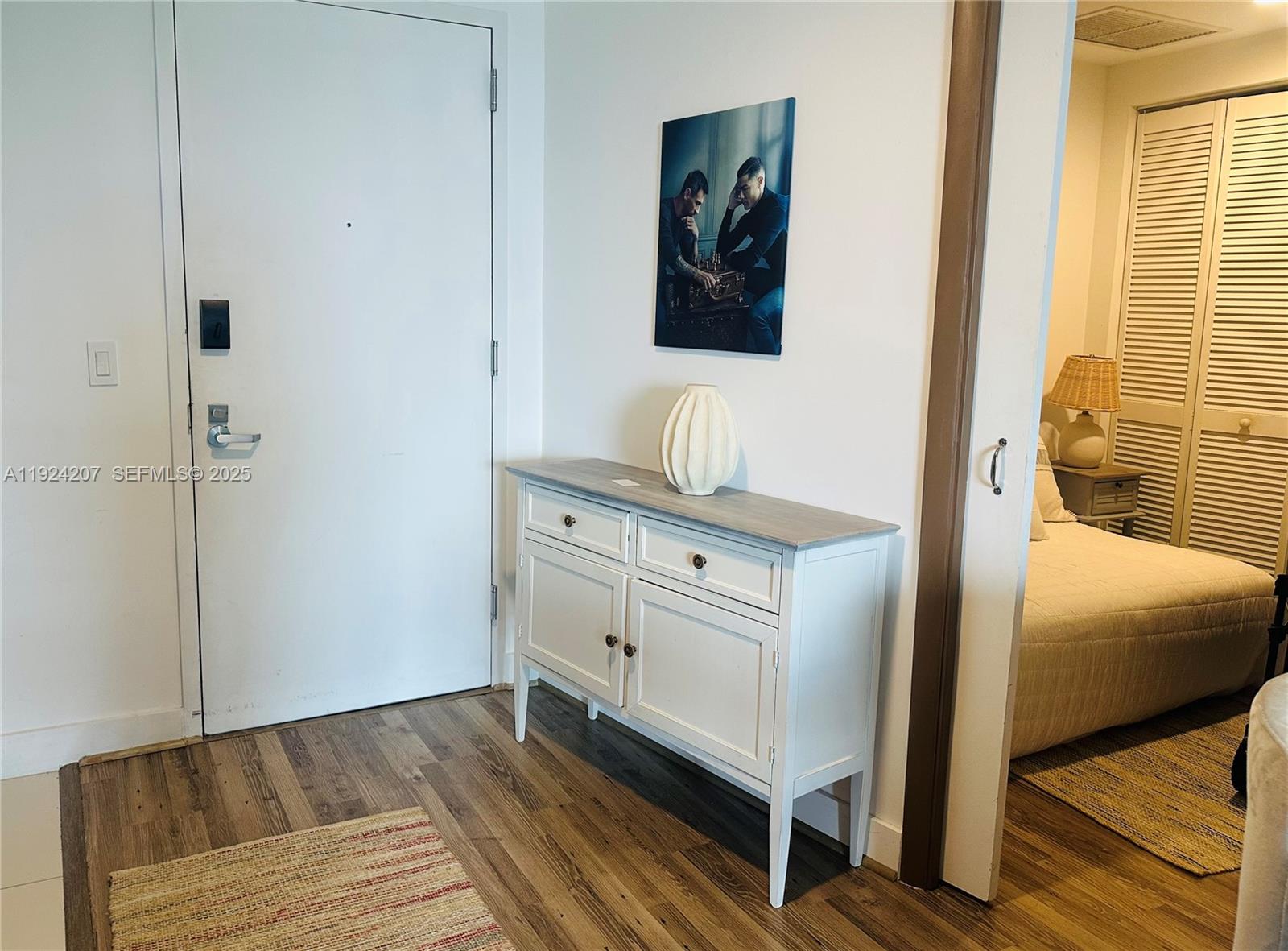 121 Northeast 34th Street, Unit 3014 Miami, FL 33137 - Photo 20 of 54 a en suite bathroom with a sink and a mirror