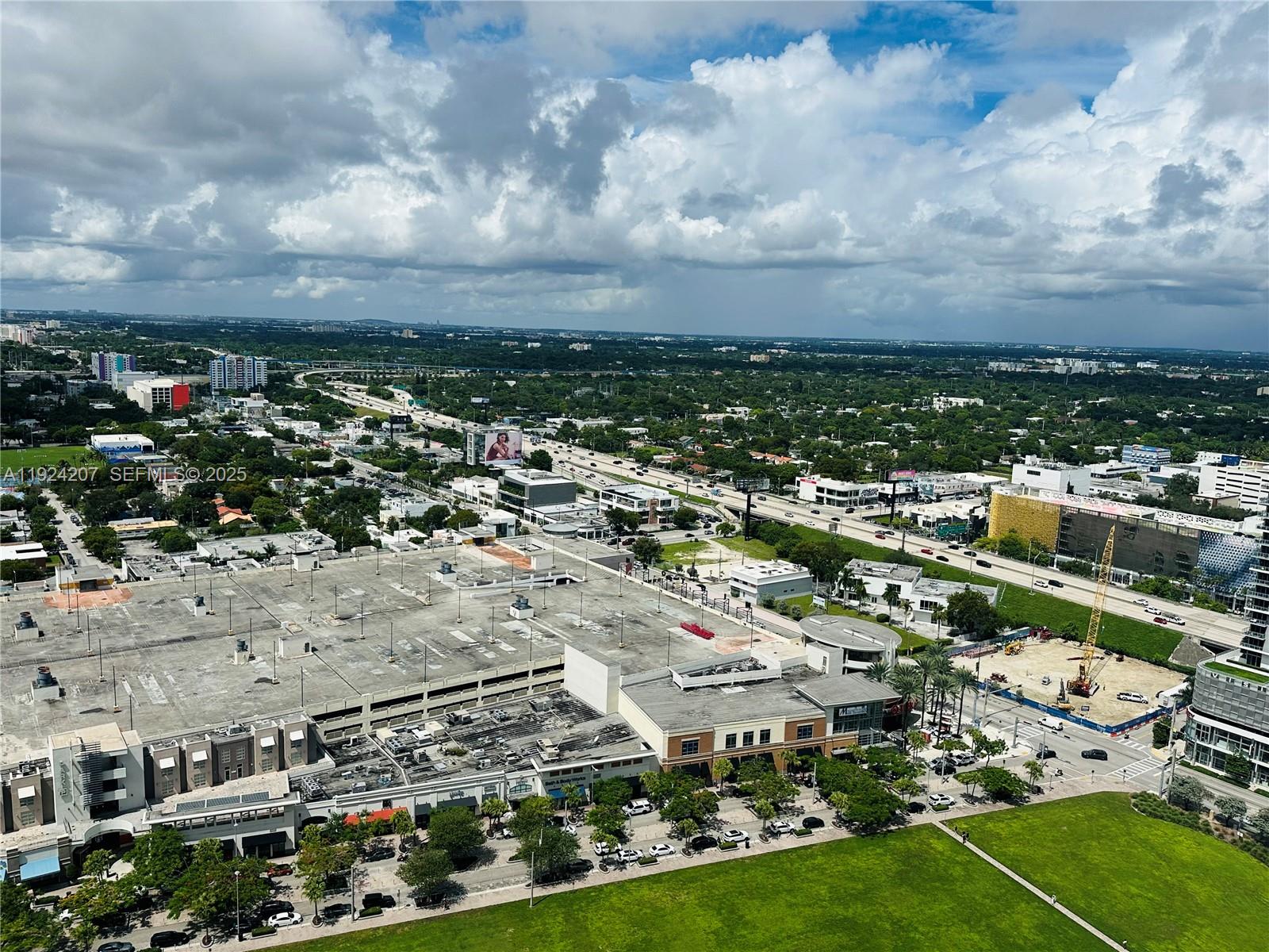 121 Northeast 34th Street, Unit 3014 Miami, FL 33137 - Photo 2 of 54 an aerial view of residential houses with outdoor space