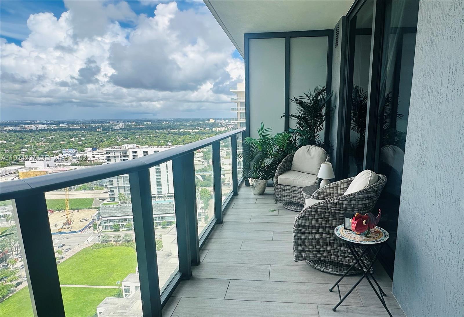 121 Northeast 34th Street, Unit 3014 Miami, FL 33137 - Photo 47 of 54 a living room with furniture
