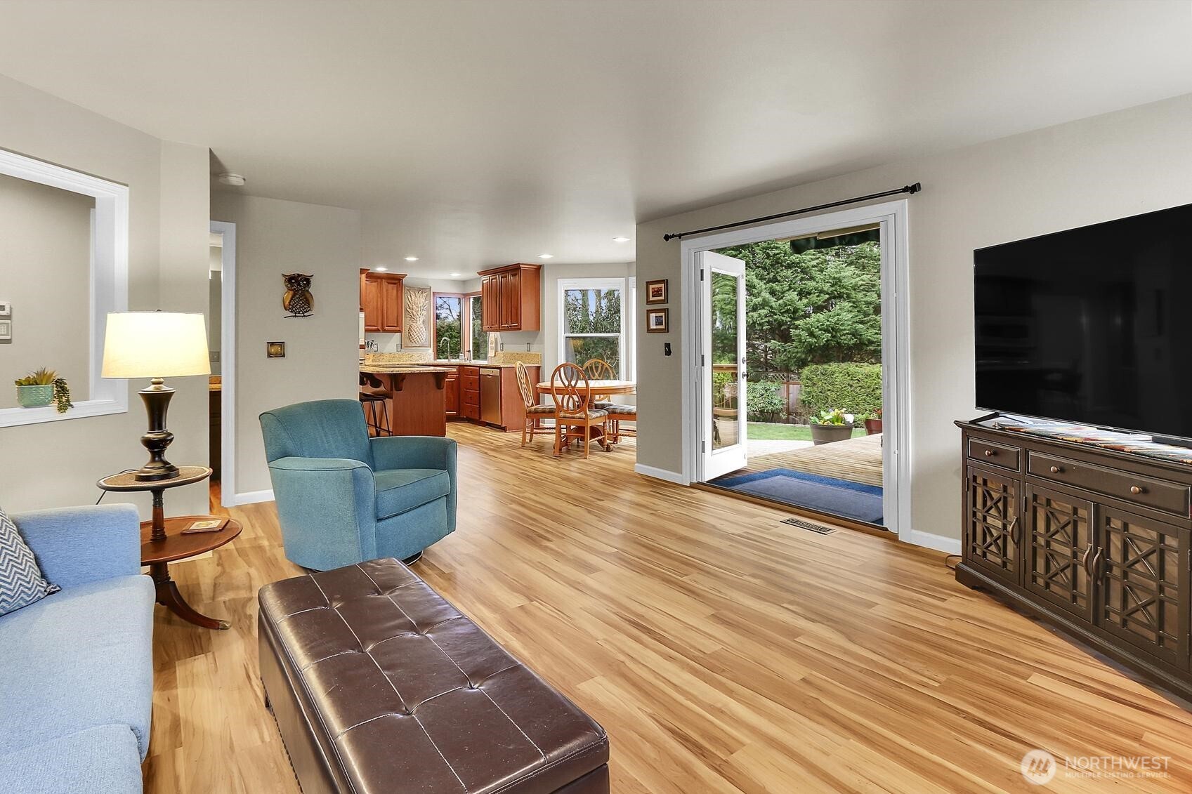 2107 237th Place Southeast Bothell, WA 98021 - Photo 17 of 40 a living room with furniture and a flat screen tv