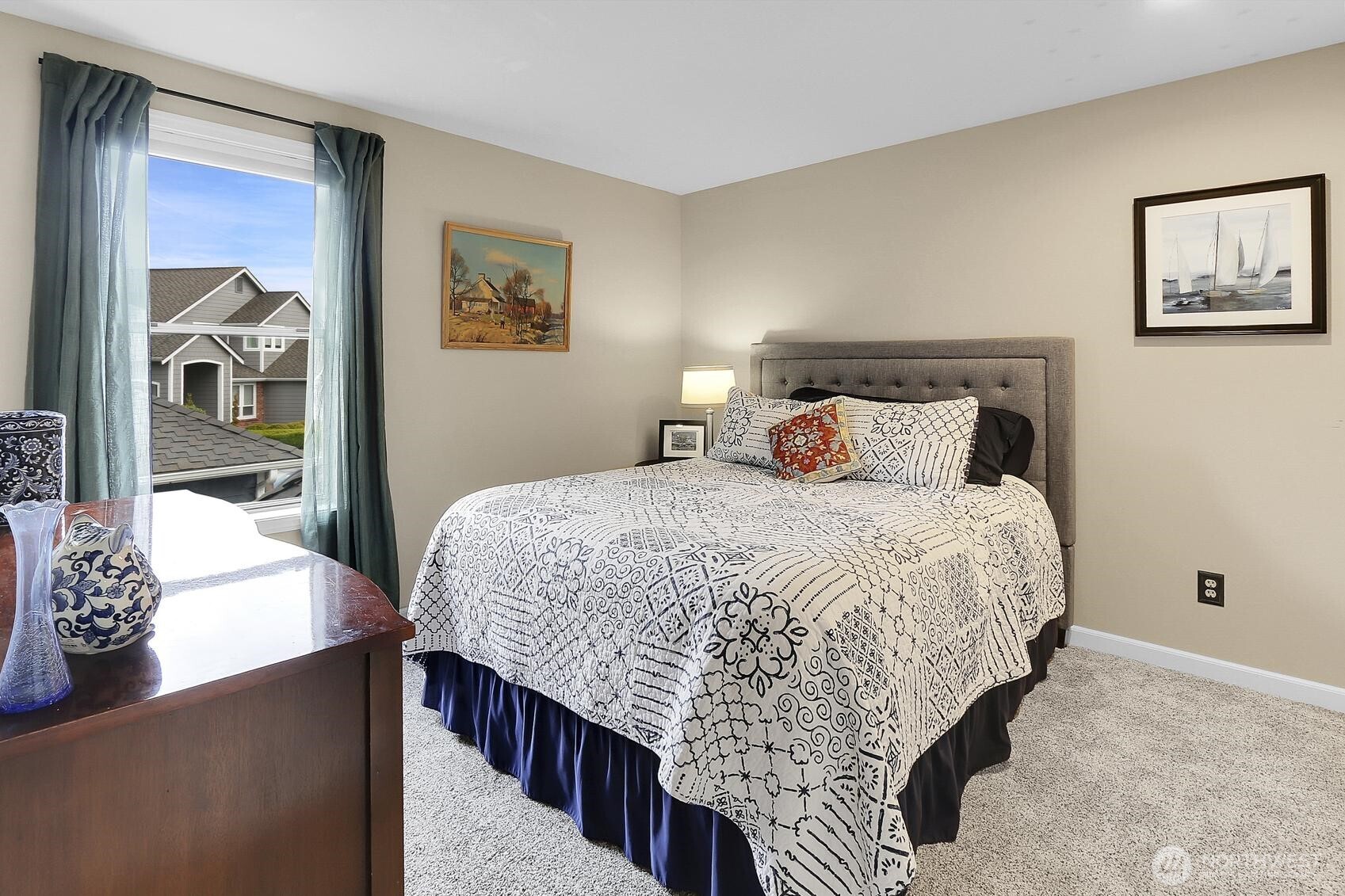 2107 237th Place Southeast Bothell, WA 98021 - Photo 25 of 40 a bedroom with bed and wall painting