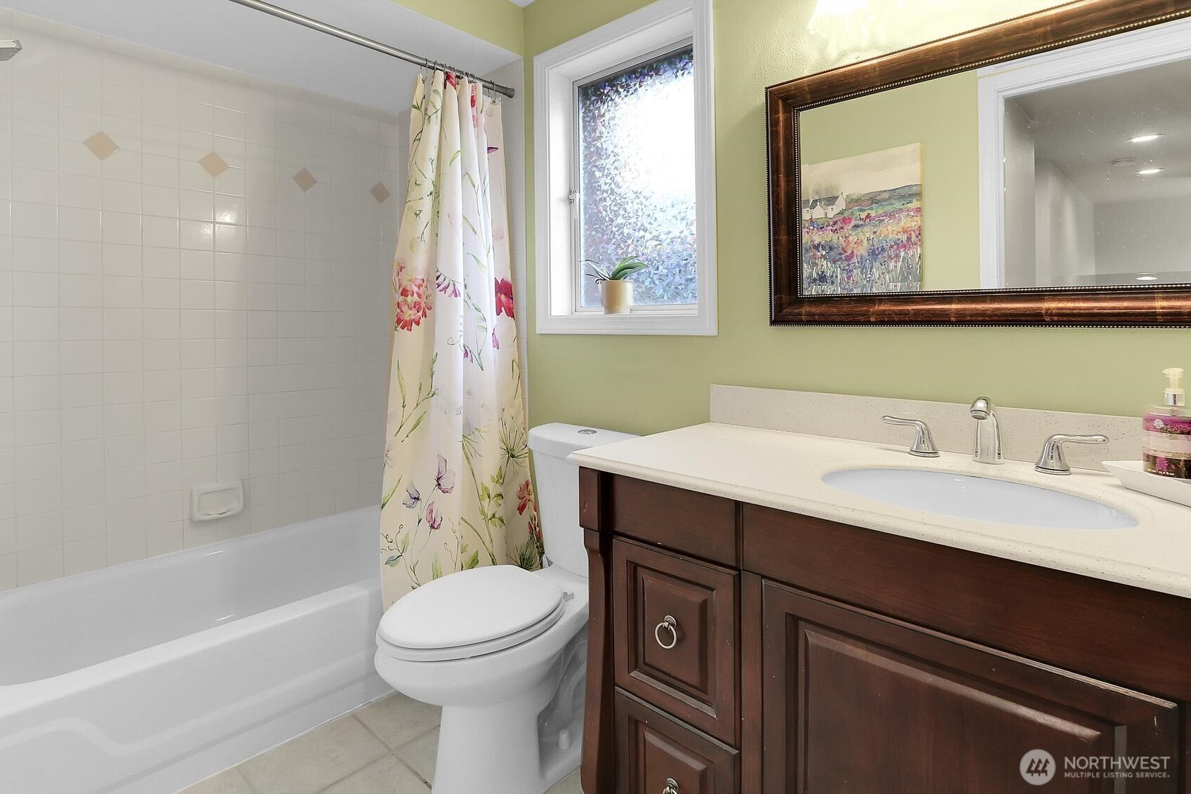 2107 237th Place Southeast Bothell, WA 98021 - Photo 26 of 40 a bathroom with a sink a toilet and shower
