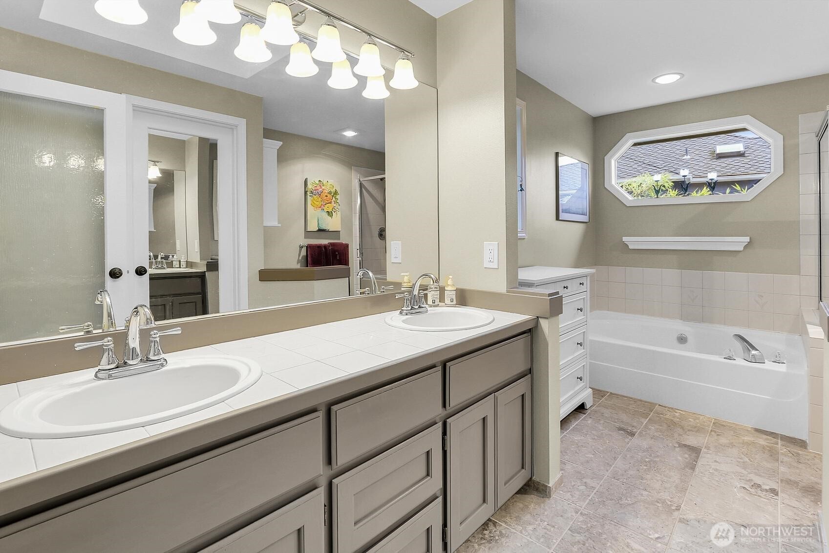 2107 237th Place Southeast Bothell, WA 98021 - Photo 29 of 40 a bathroom with a sink double vanity granite tub and a mirror