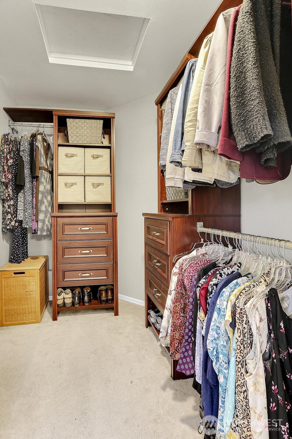 2107 237th Place Southeast Bothell, WA 98021 - Photo 31 of 40 a view of walk in closet with clothes and shoes