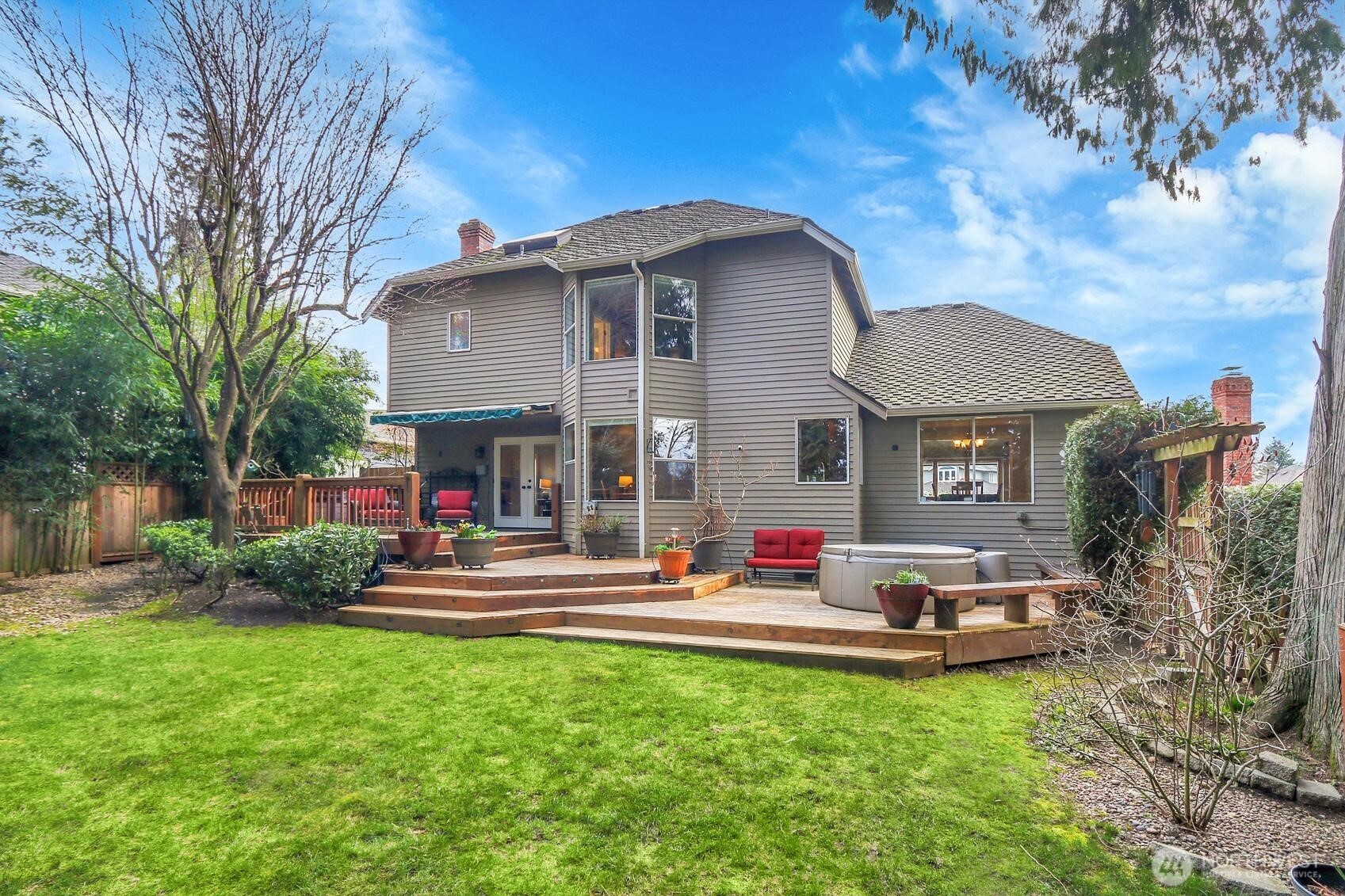 2107 237th Place Southeast Bothell, WA 98021 - Photo 32 of 40 a front view of house with small garden and outdoor seating