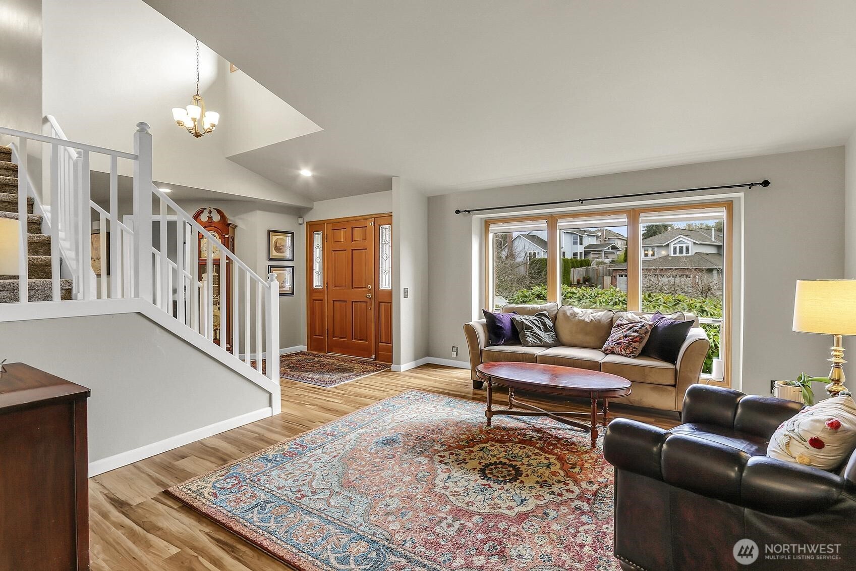 2107 237th Place Southeast Bothell, WA 98021 - Photo 4 of 40 a living room with furniture and a rug