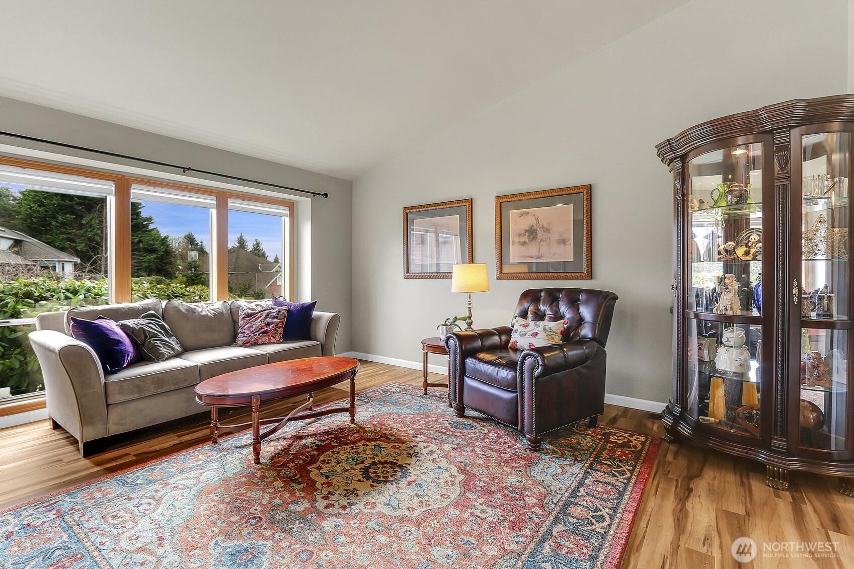 2107 237th Place Southeast Bothell, WA 98021 - Photo 5 of 40 a living room with furniture and a floor to ceiling window