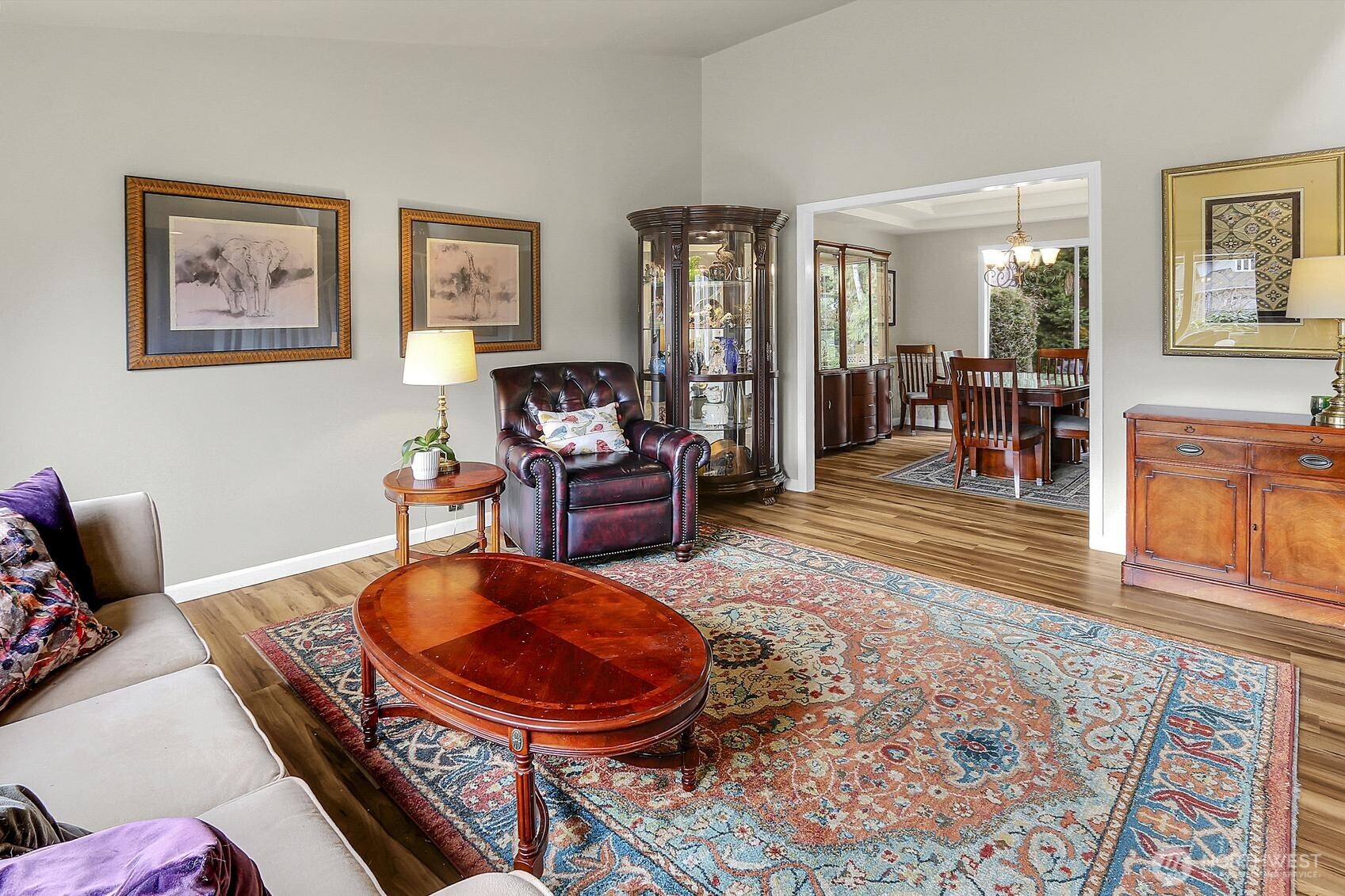 2107 237th Place Southeast Bothell, WA 98021 - Photo 6 of 40 a living room with furniture and a wooden floor