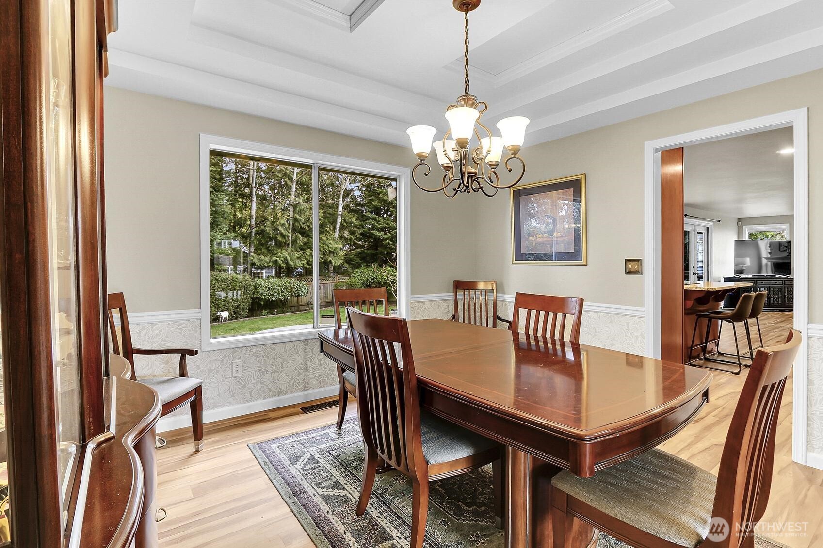 2107 237th Place Southeast Bothell, WA 98021 - Photo 10 of 40 a view of a dining room with furniture window and wooden floor