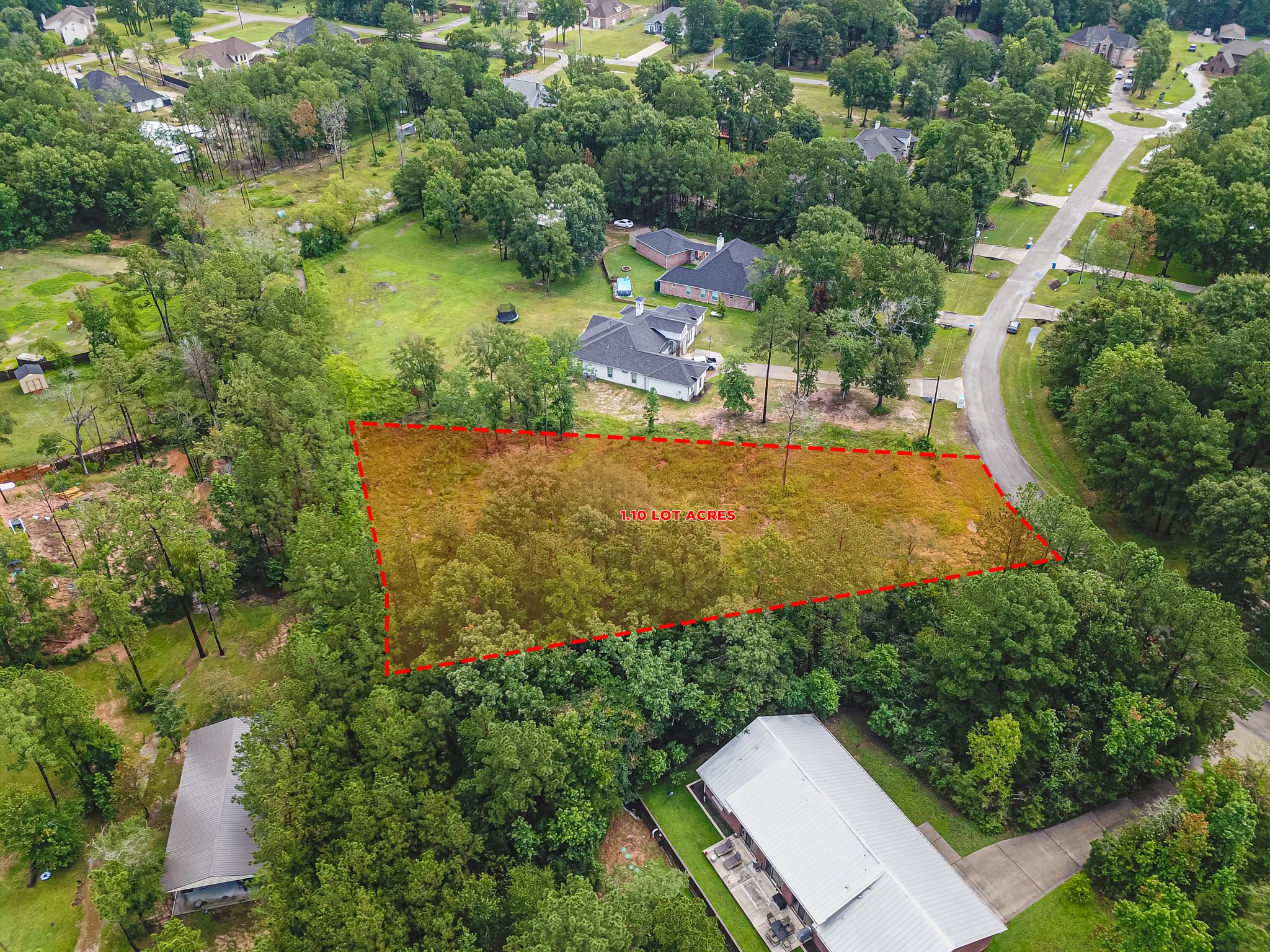 18332 Wisp Willow Way Porter, TX 77365 - Photo 15 of 48 an aerial view of a house with a yard and lake view