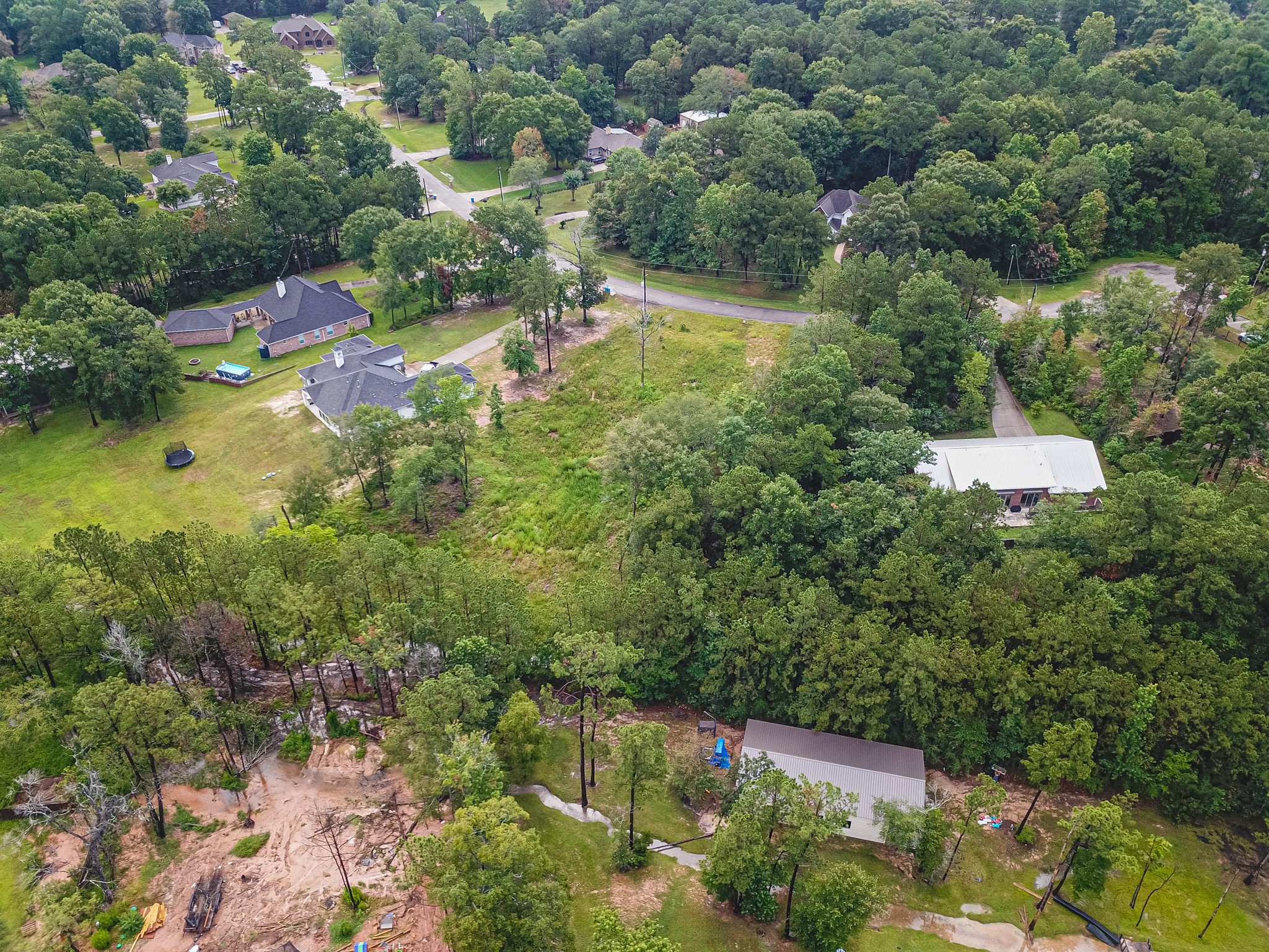 18332 Wisp Willow Way Porter, TX 77365 - Photo 35 of 48 an aerial view of residential house with outdoor space and trees all around