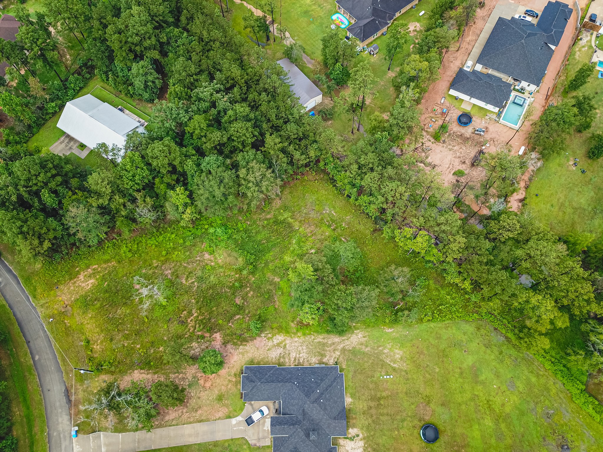 18332 Wisp Willow Way Porter, TX 77365 - Photo 37 of 48 an aerial view of residential house with outdoor space and trees all around