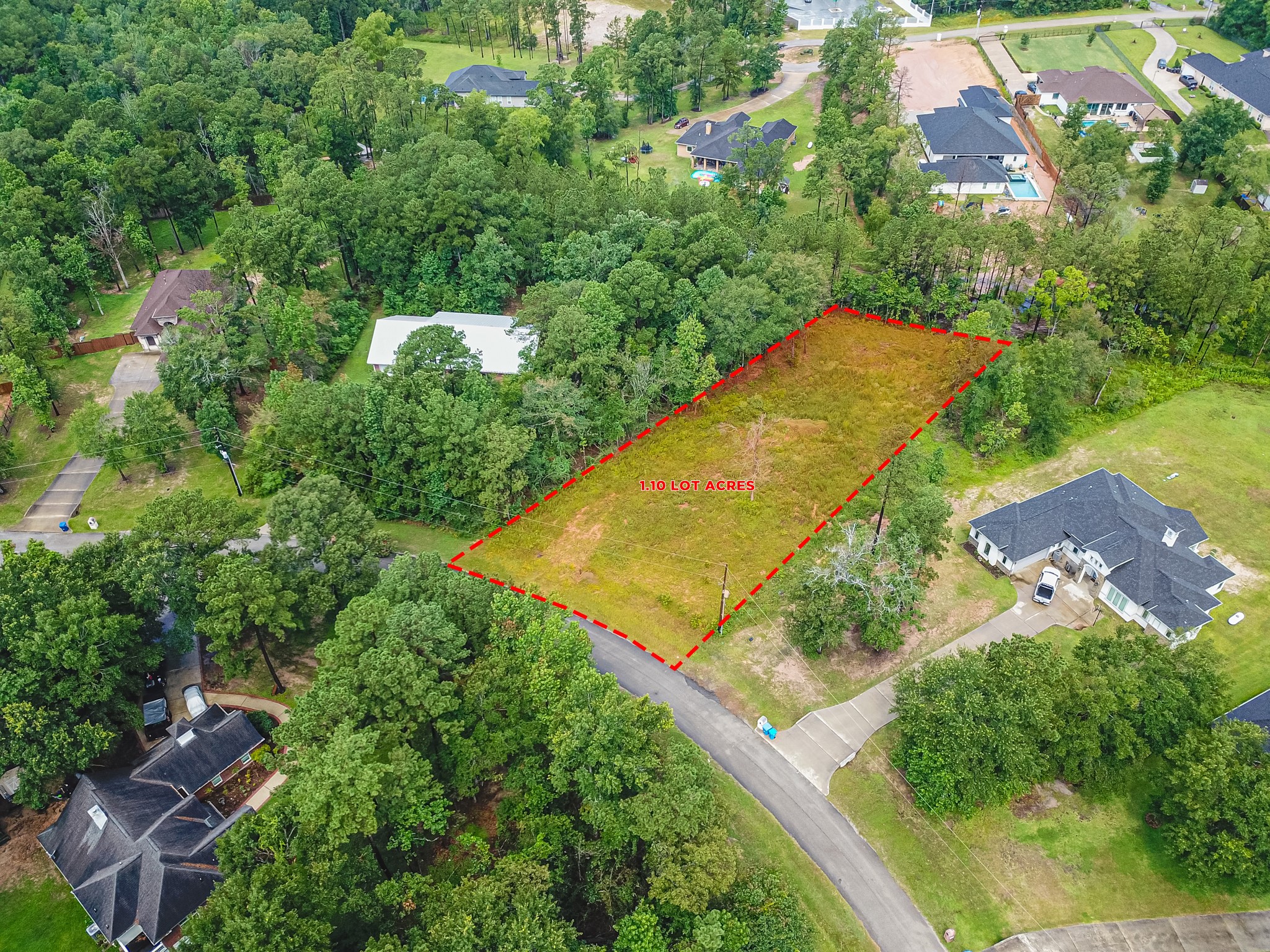 18332 Wisp Willow Way Porter, TX 77365 - Photo 5 of 48 an aerial view of residential houses with outdoor space and trees all around