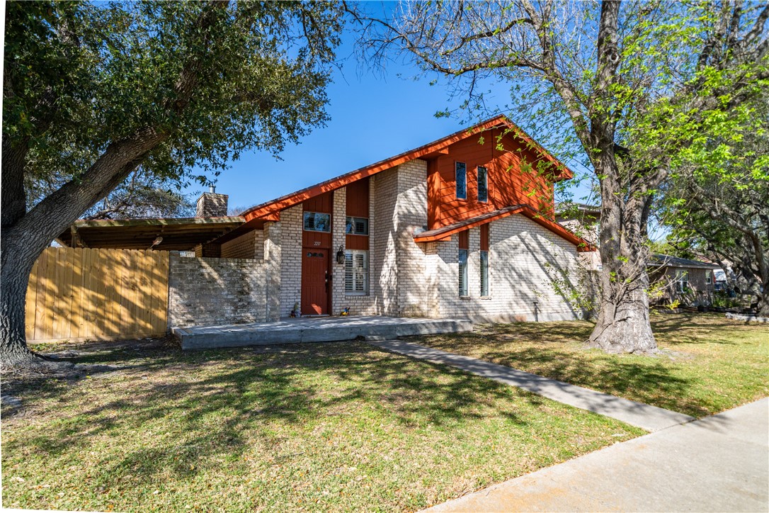 2217 Post Oak Drive Portland, TX 78374 - Photo 2 of 39 a view of outdoor space with wooden fence