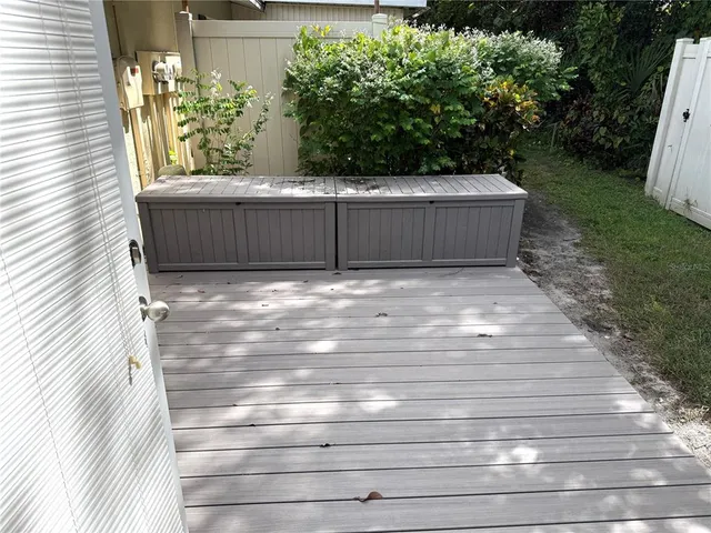 a view of backyard with green space