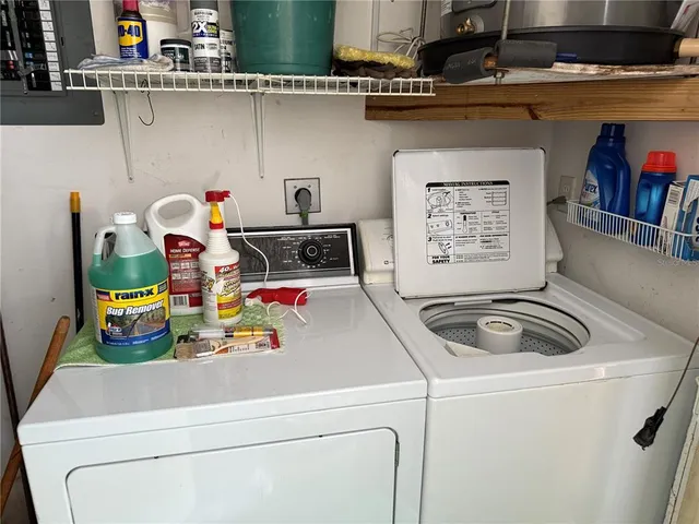 a utility room with dryer and washer