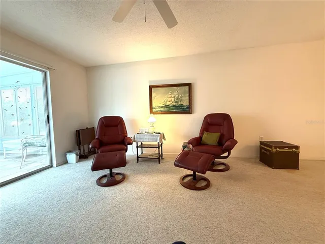 a workspace with furniture and gym equipment