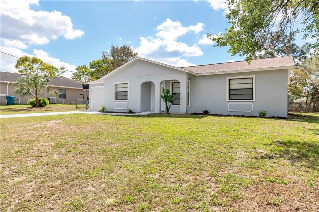 12204 Shafton Road Spring Hill, FL 34608 - Photo 1 of 1 The Entire Home is Is Freshly Painted ! Both Inside and Outside.