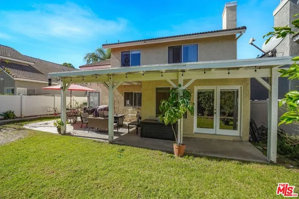 a view of a house with patio