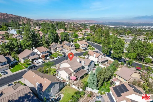 an aerial view of a city with lots of residential buildings