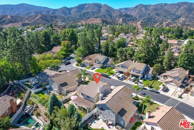 an aerial view of a city with lots of residential buildings