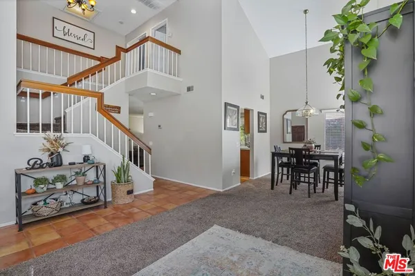 a view of entryway livingroom and hall
