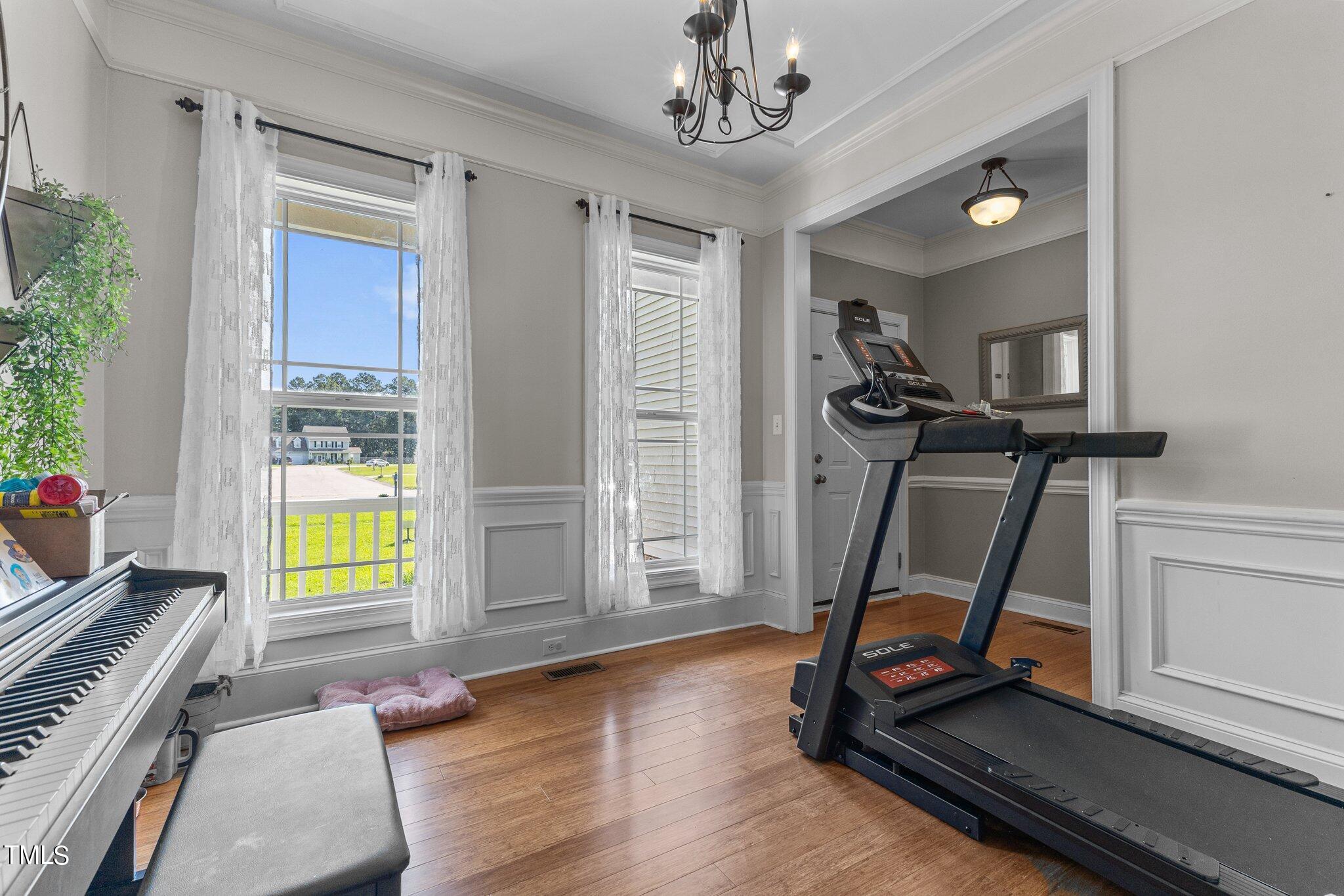 156 Williams Creek Drive Erwin, NC 28339 - Photo 14 of 37 a view of a room with gym equipment