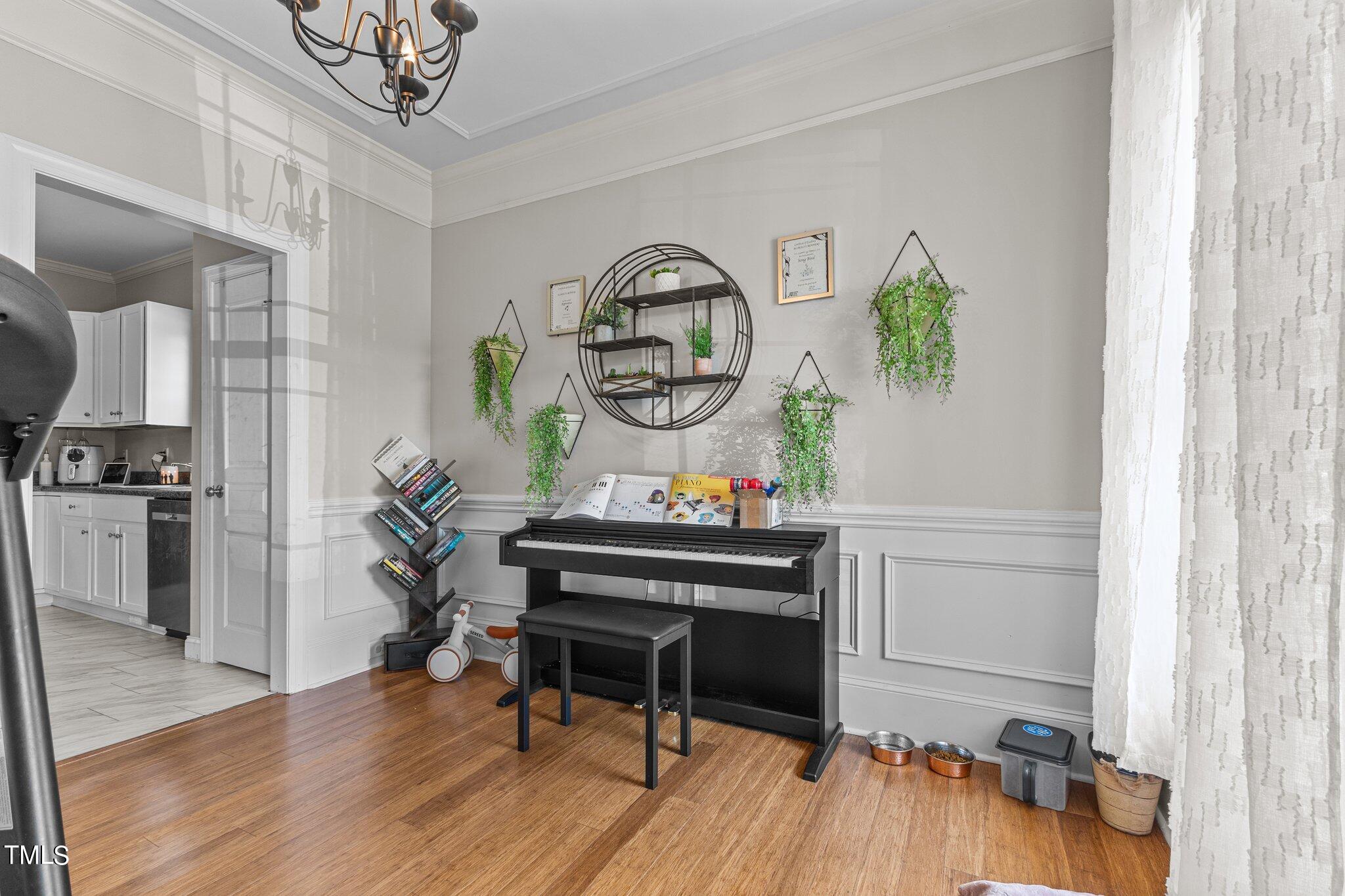 156 Williams Creek Drive Erwin, NC 28339 - Photo 15 of 37 a living room with furniture and a wooden floor