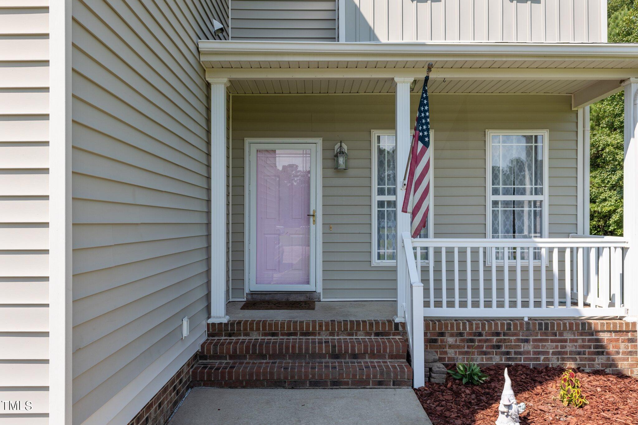156 Williams Creek Drive Erwin, NC 28339 - Photo 2 of 37 a view of a house with a door and wooden floor