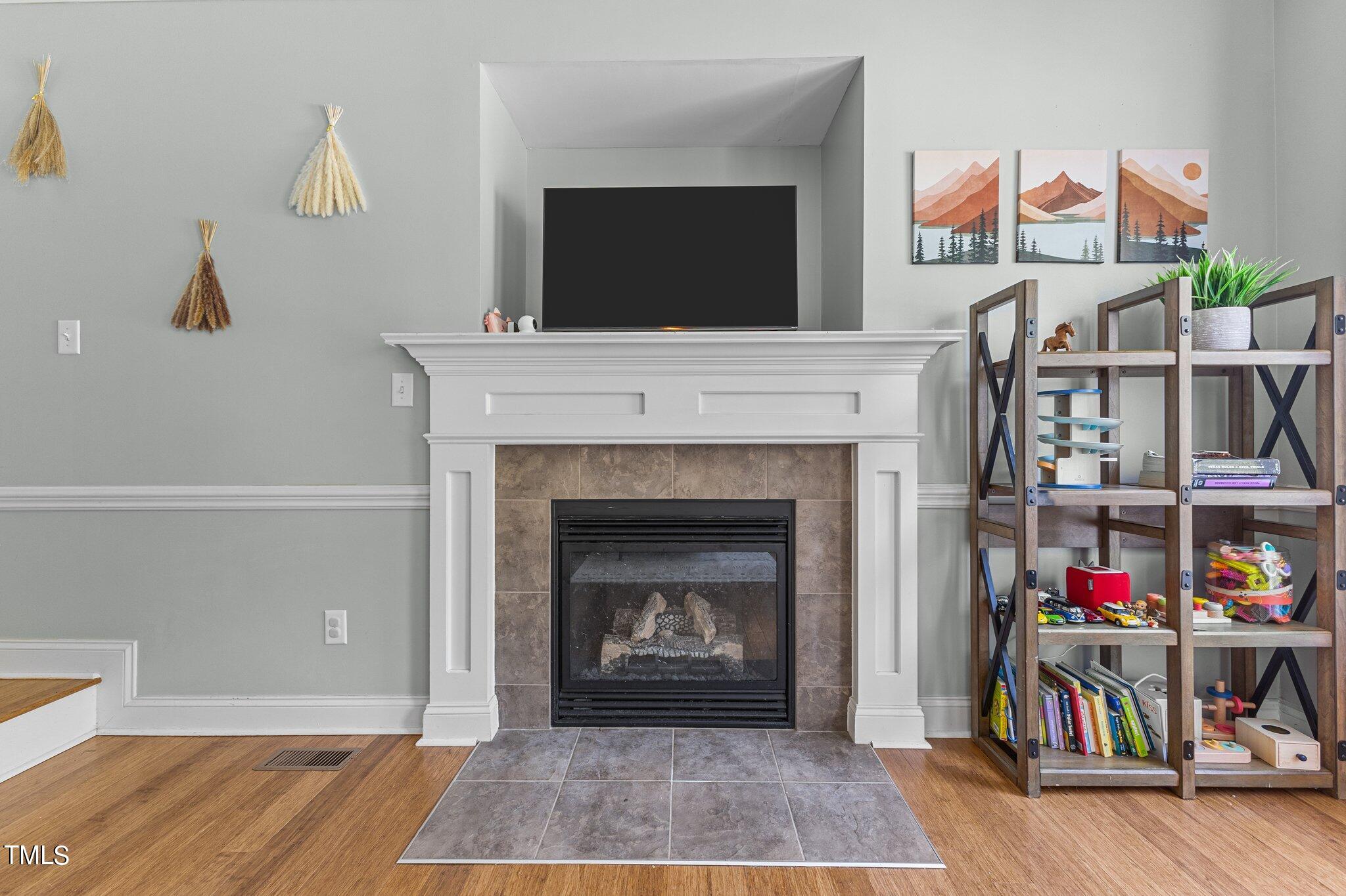 156 Williams Creek Drive Erwin, NC 28339 - Photo 22 of 37 a living room with furniture and a fireplace