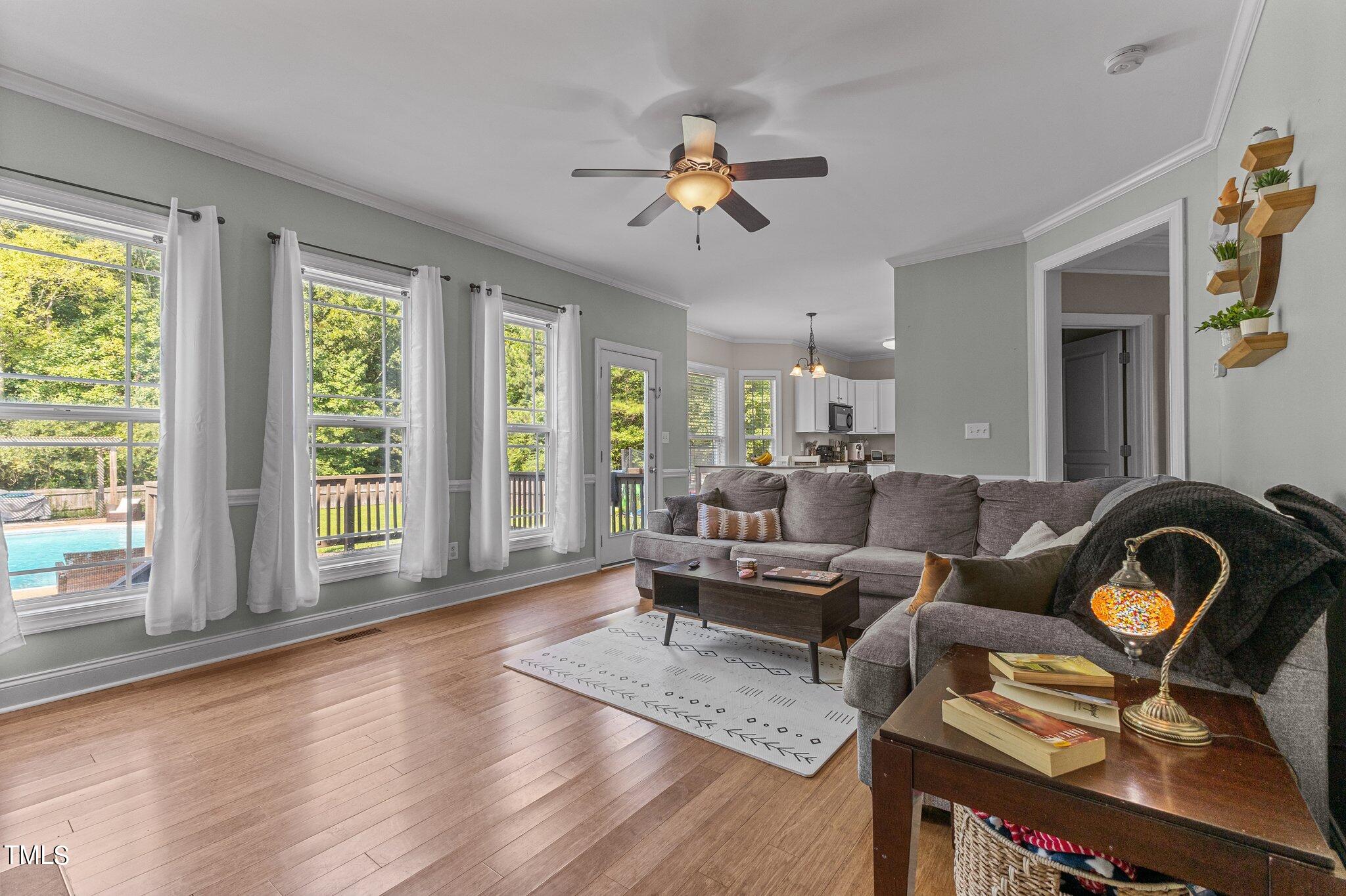 156 Williams Creek Drive Erwin, NC 28339 - Photo 24 of 37 a living room with furniture and wooden floor