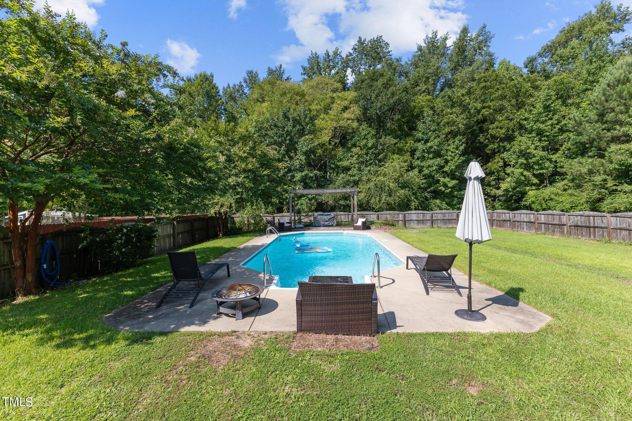 156 Williams Creek Drive Erwin, NC 28339 - Photo 29 of 37 a view of a garden with a slide