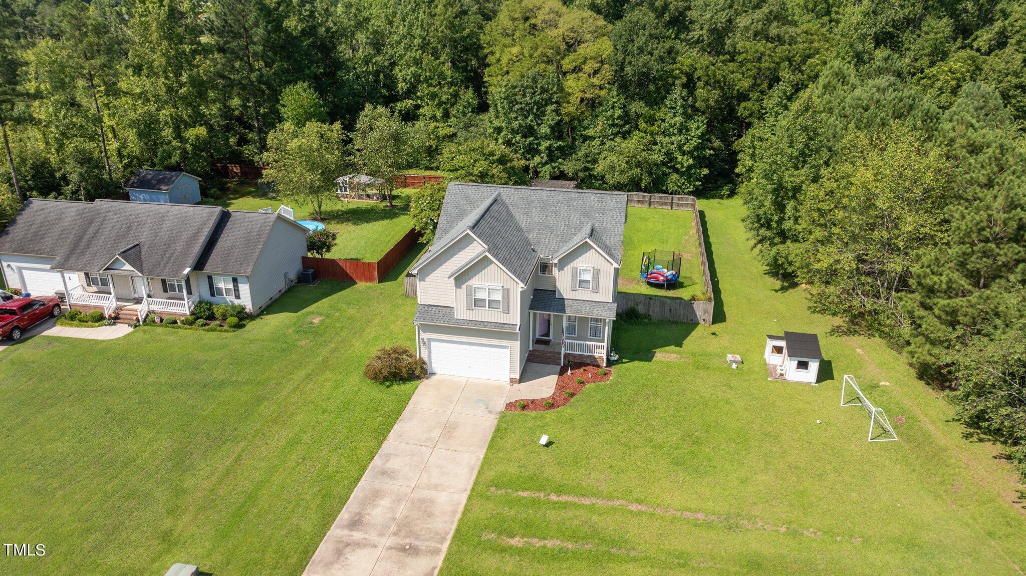 156 Williams Creek Drive Erwin, NC 28339 - Photo 32 of 37 a view of a house with a yard