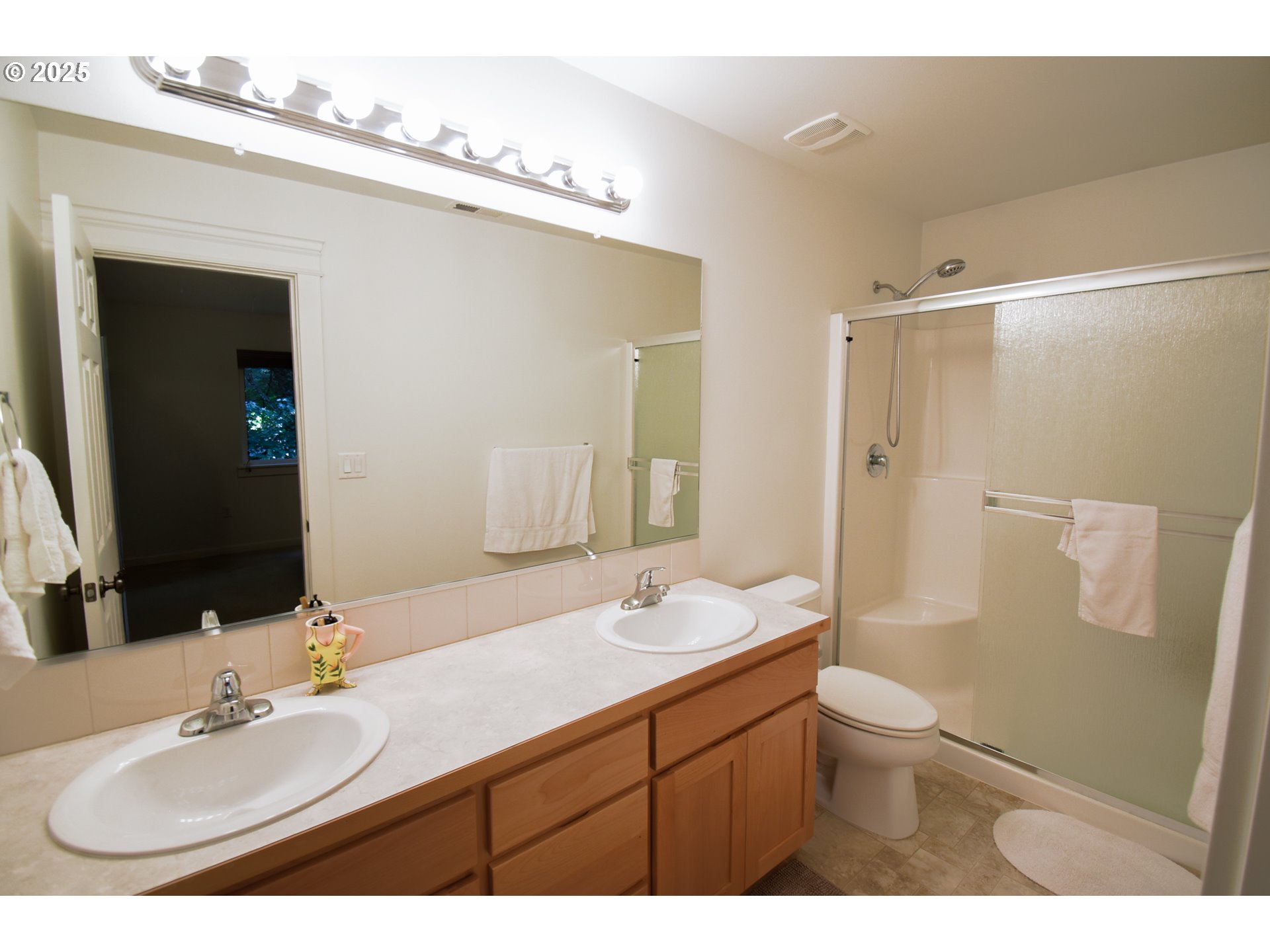 45 Katani Lane Cascade Locks, OR 97014 - Photo 11 of 28 a bathroom with a sink a toilet and shower
