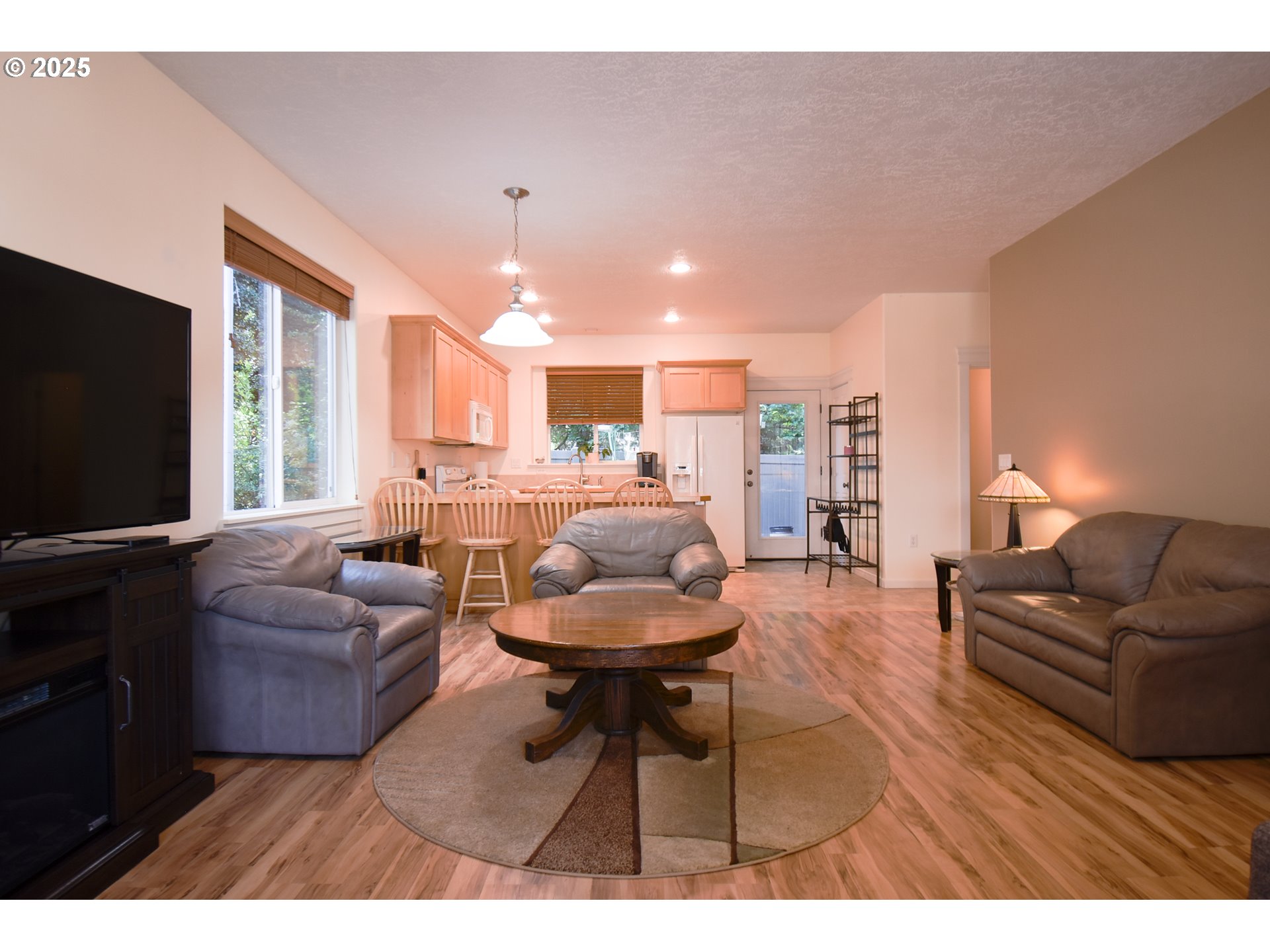 45 Katani Lane Cascade Locks, OR 97014 - Photo 3 of 28 a living room with furniture and a flat screen tv