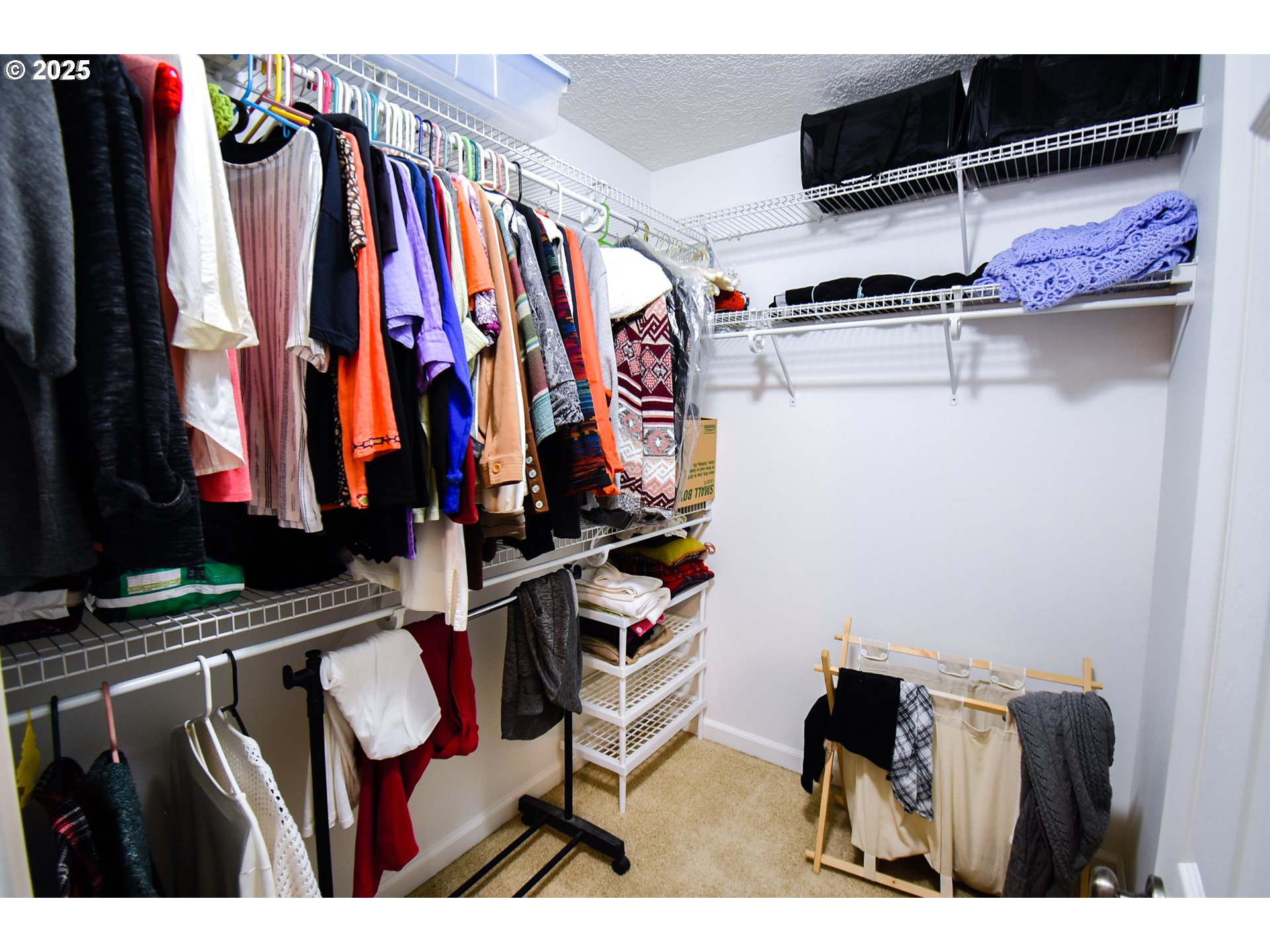 45 Katani Lane Cascade Locks, OR 97014 - Photo 10 of 28 a view of walk in closet with clothes and shoes