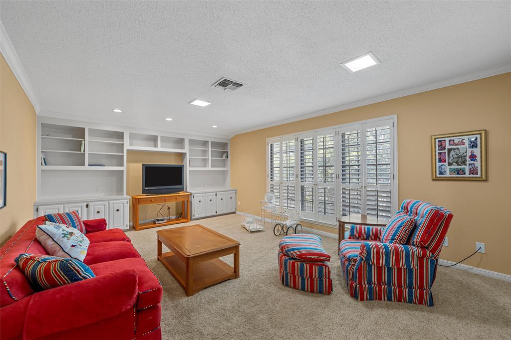3907 Old Mill Road Waco, TX 76710 - Photo 19 of 30 a living room with furniture and a flat screen tv